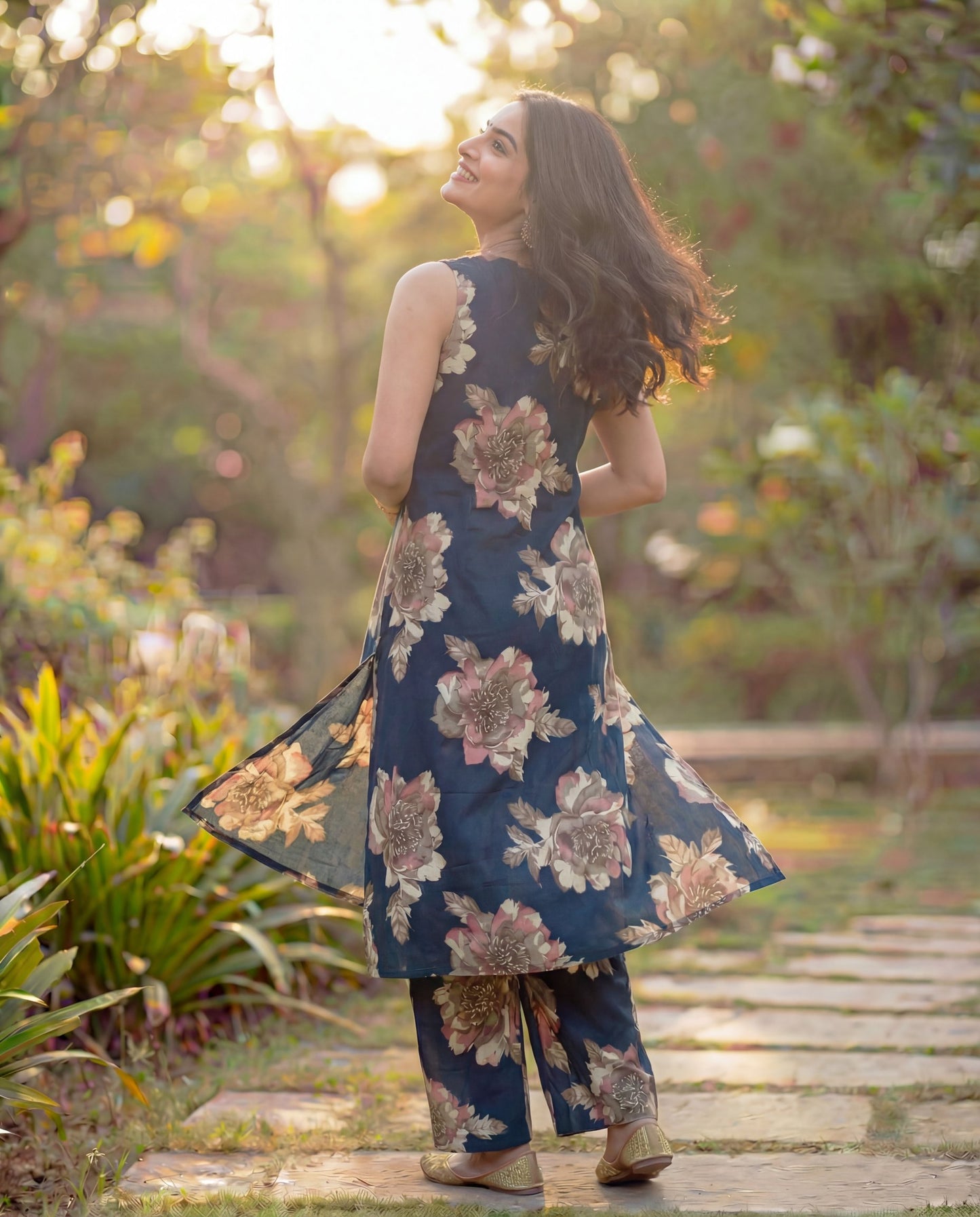 Stylish Navy Blue Viscose Rayon Sleeveless Kurta Set with Floral Print