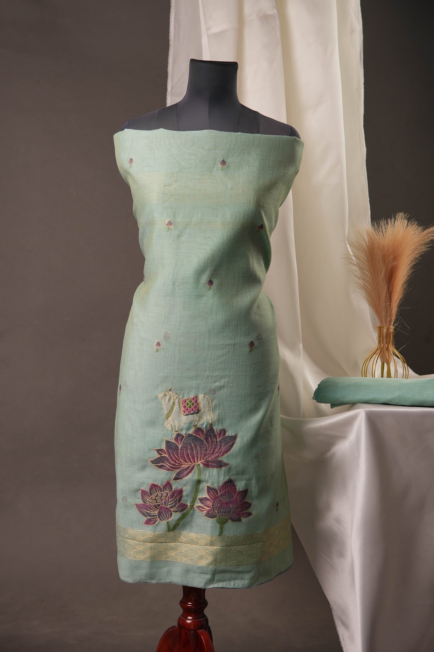 Lotus Floral Sky Blue Muga Cotton Unstitched Suit with Lotus & Cow Weaving and Tassel Dupatta