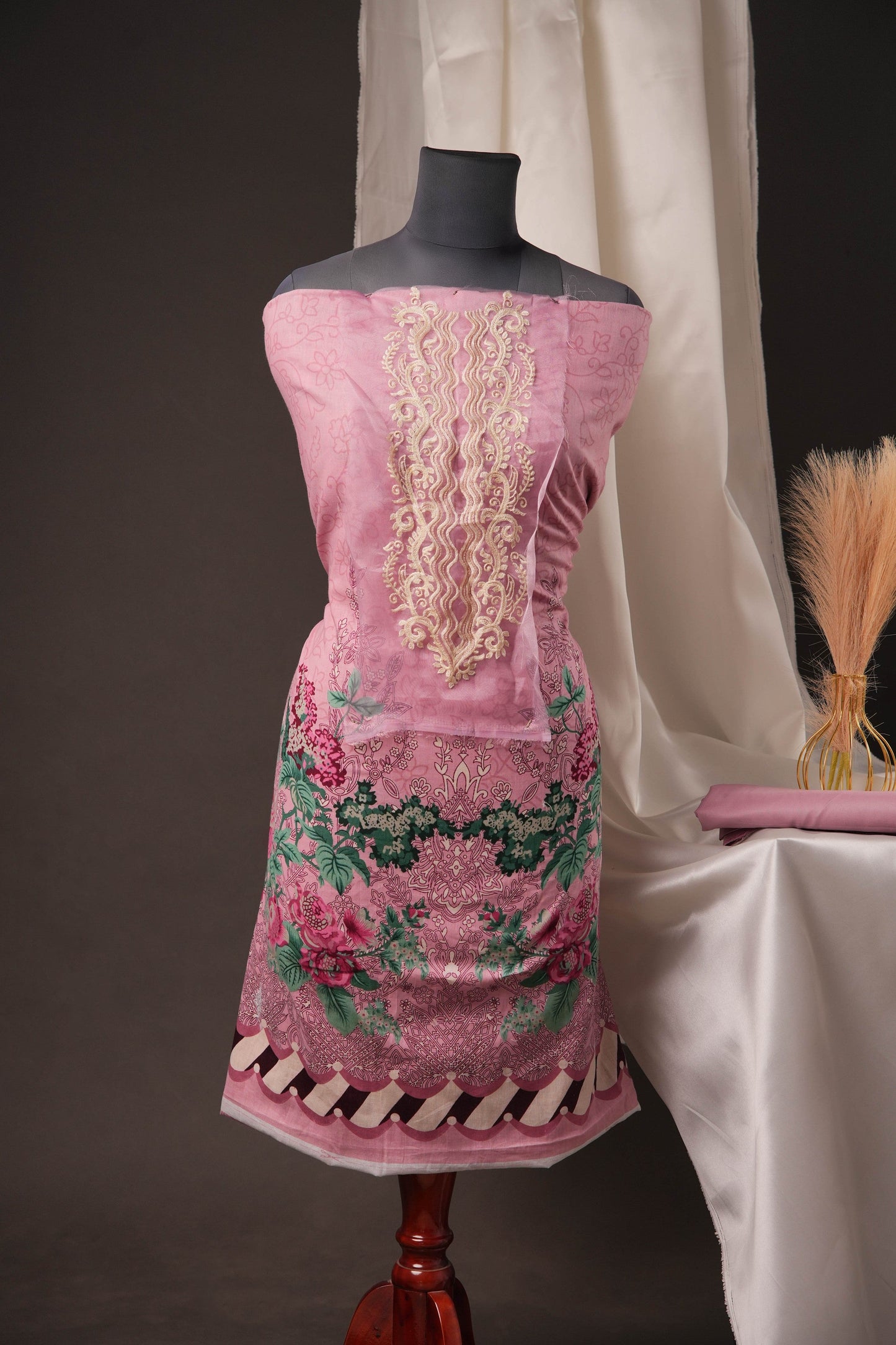Pink Pakistani Unstitched Suit with Embroidered Neck Patch & Dual Sleeve Borders.