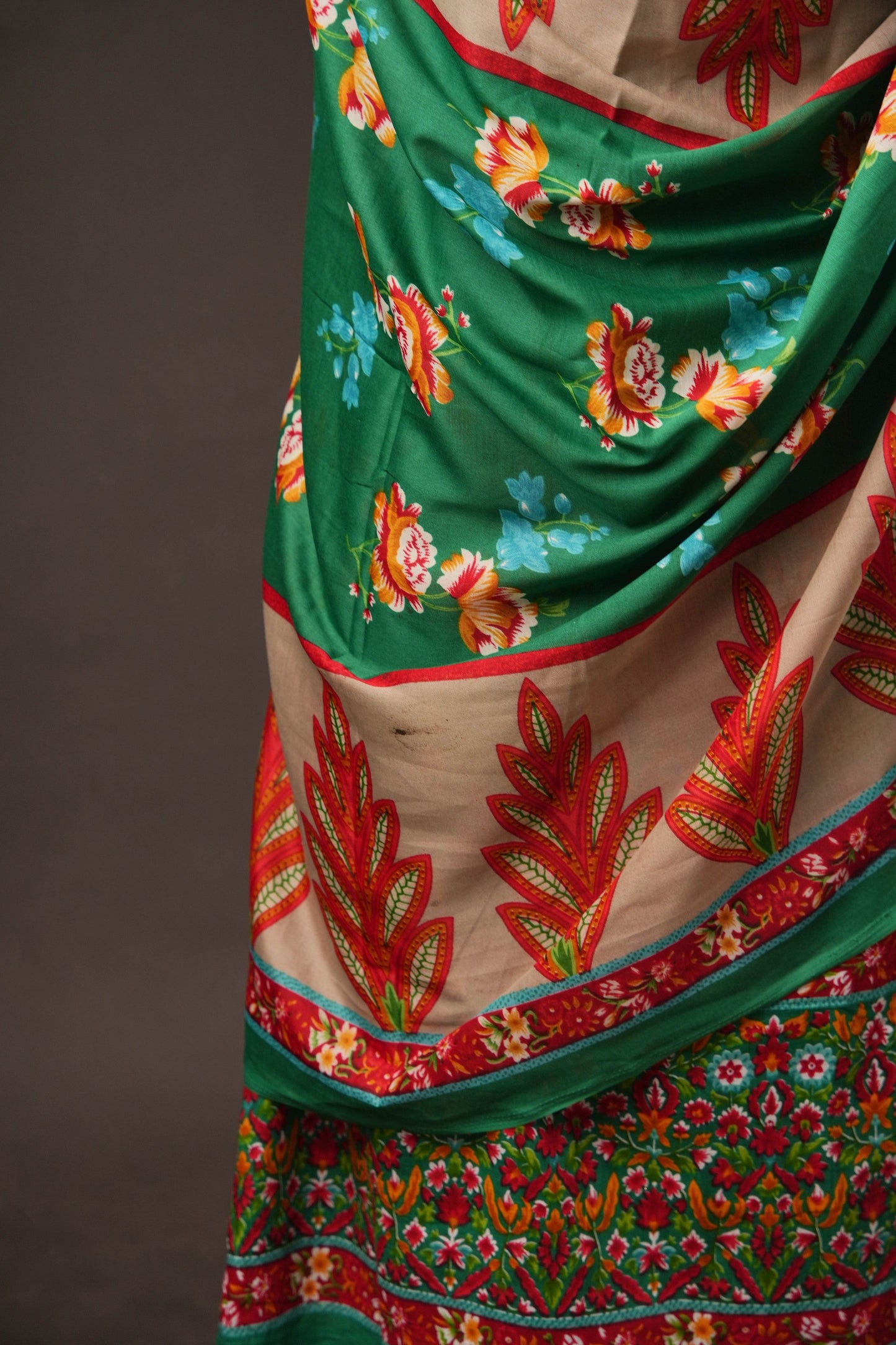 Green Pakistani Unstitched Suit with Embroidered Neck Patch & Puff Sleeve.