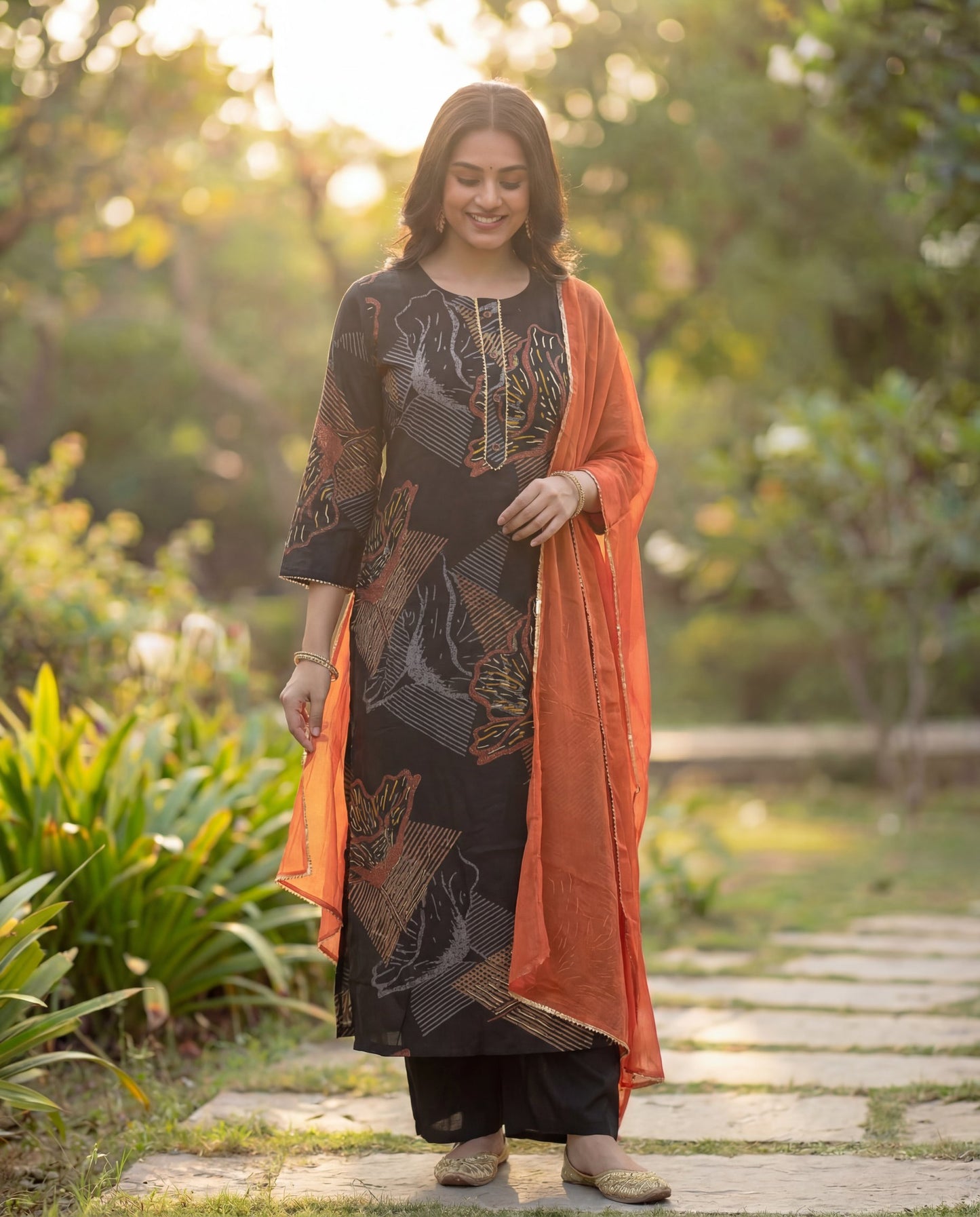 Stylish Black Viscose Rayon Kurta Set with Abstract Print & Orange Chiffon Dupatta