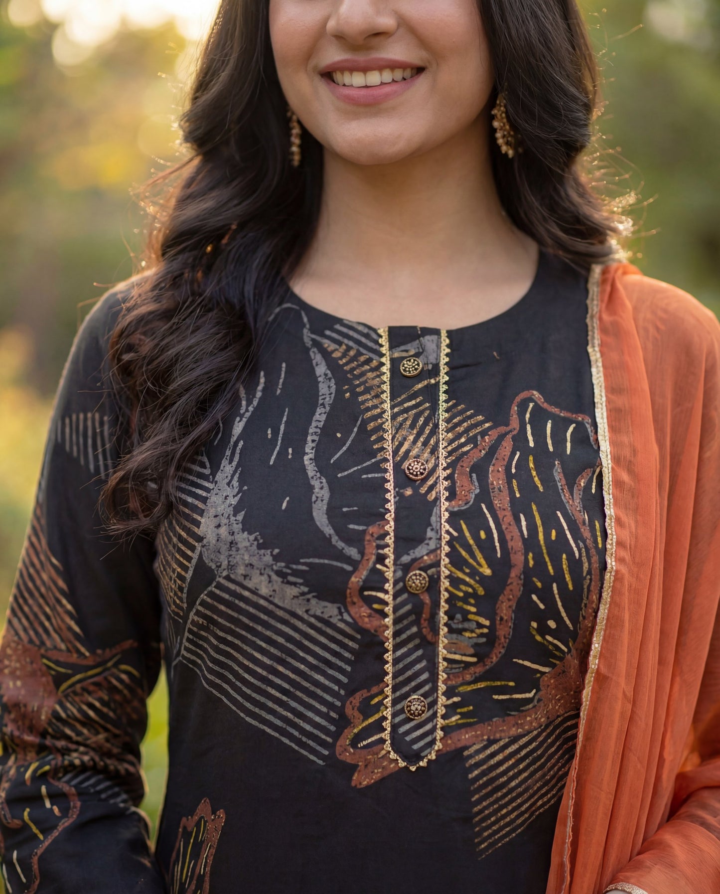 Stylish Black Viscose Rayon Kurta Set with Abstract Print & Orange Chiffon Dupatta