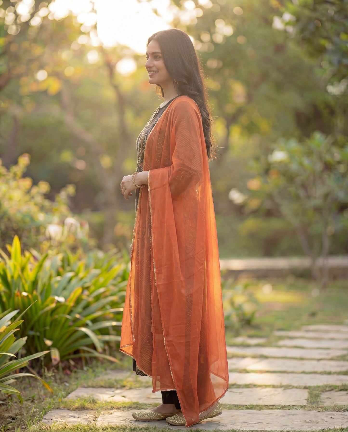 Stylish Black Viscose Rayon Kurta Set with Abstract Print & Orange Chiffon Dupatta