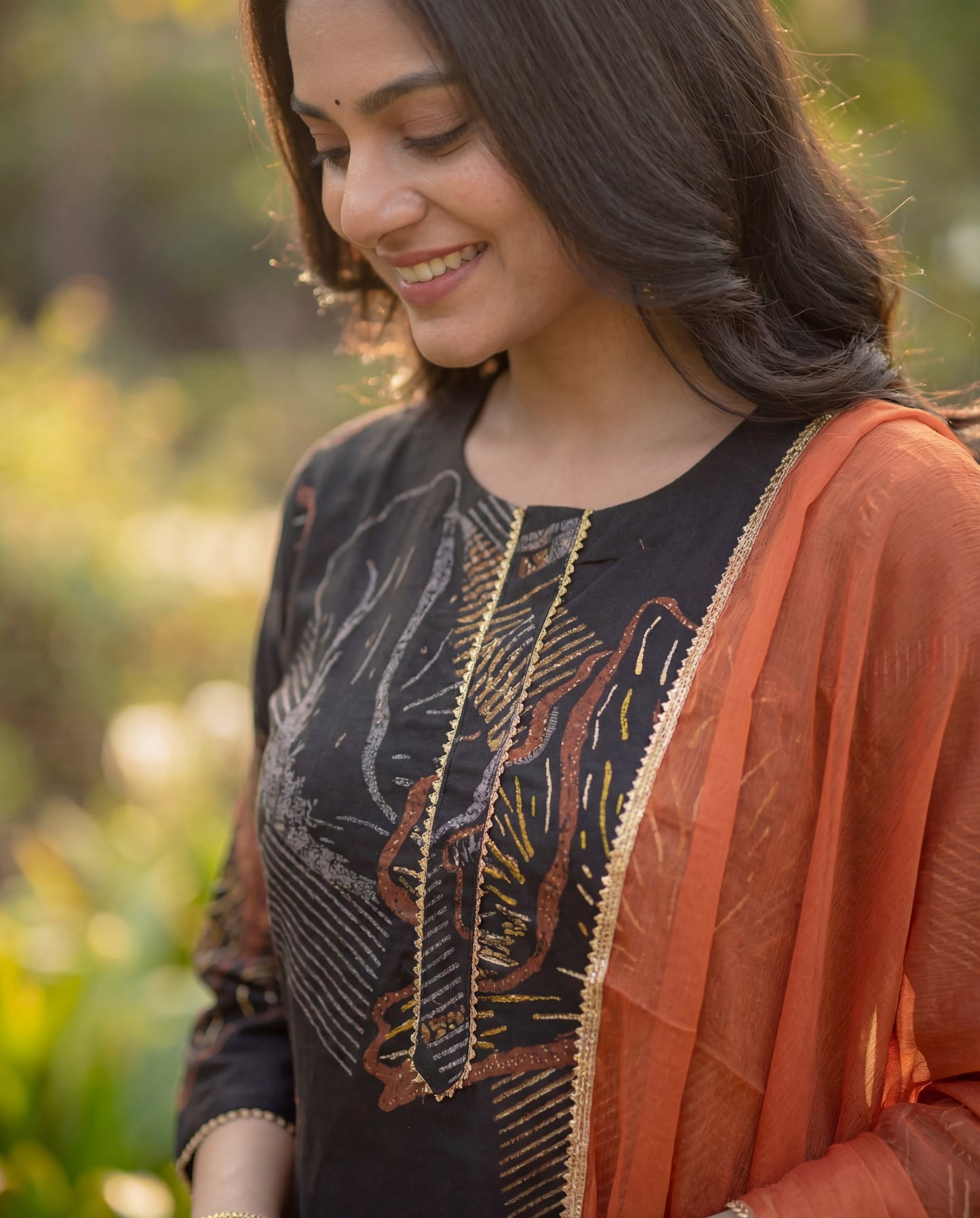 Stylish Black Viscose Rayon Kurta Set with Abstract Print & Orange Chiffon Dupatta
