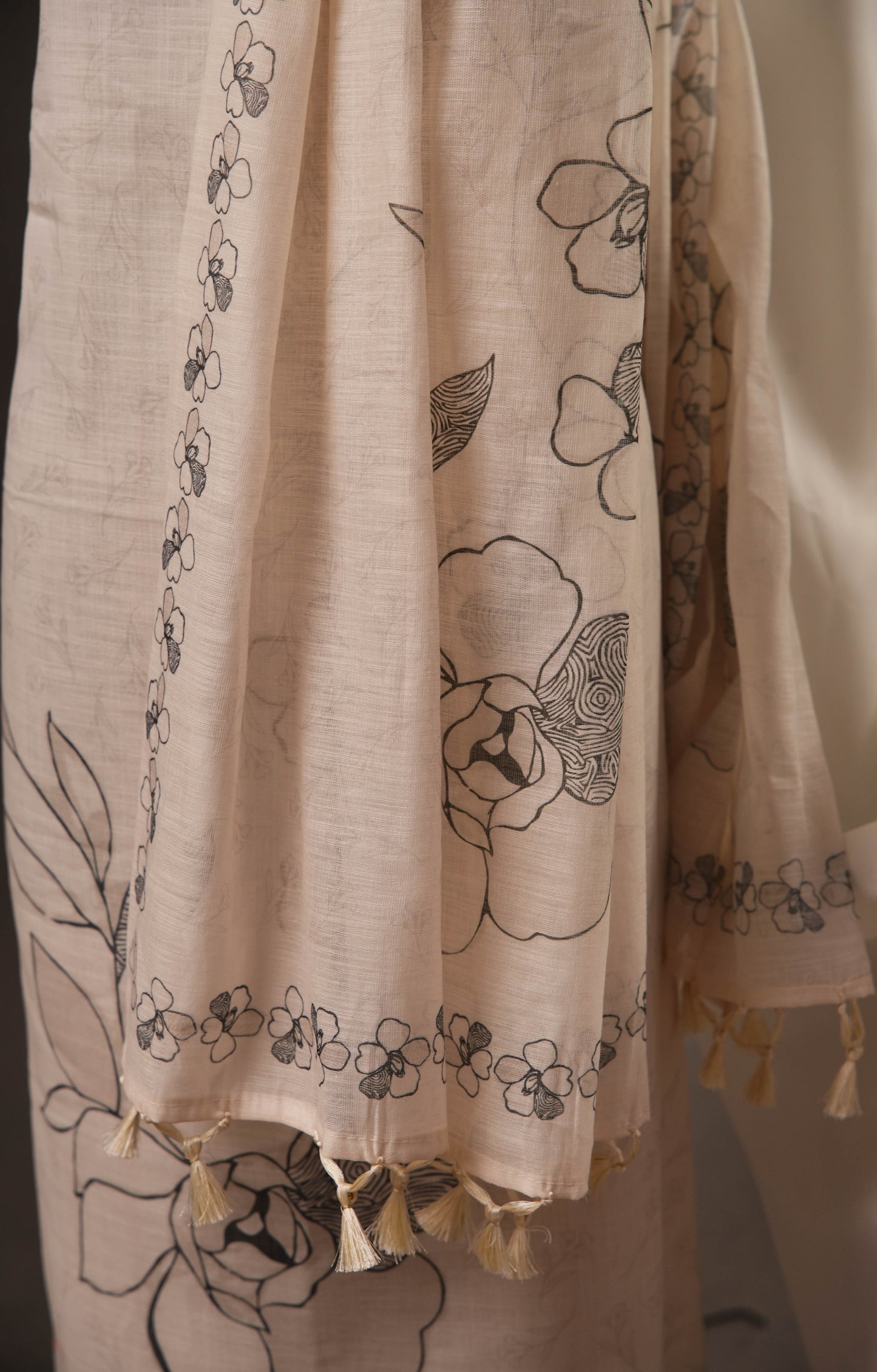 Outline Floral Off-White Unstitched Suit with Black Floral Print and Tassel Dupatta