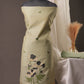 Pista Green Muga Cotton Unstitched Suit with Black Floral Weaving & Tassel Dupatta