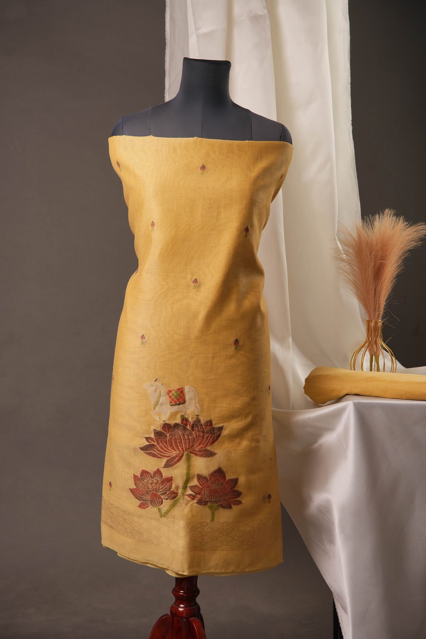 Lotus Floral Golden Yellow Muga Cotton Unstitched Suit with Lotus & Cow Weaving and Tassel Dupatta