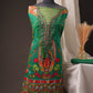 Green Pakistani Unstitched Suit with Embroidered Neck Patch & Puff Sleeve.